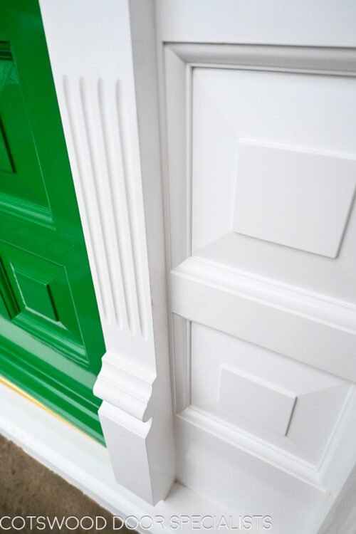 ornamental Edwardian front door with stained glass. A decorative 17 light Edwardian front door with decorative features such as a shelf and dentil block and an apron of which the letterplate is fixed too. The frame is a large frame with sidelights and glazing above the door. The door frame is very ornamental with pilasters (detailed moulding forming columns each side of the door) supporting a decorative transom with detailed mouldings and a dentil block. The stained glass is a art nouveau design featuring roses. door and frame are a replica of the orignal Edwardian joinery. Handmade in Accoya wood and fitted with multipoint locking. Detailed picture of pilaster column